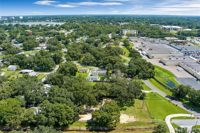 an aerial view of lake residential houses with outdoor space and river
