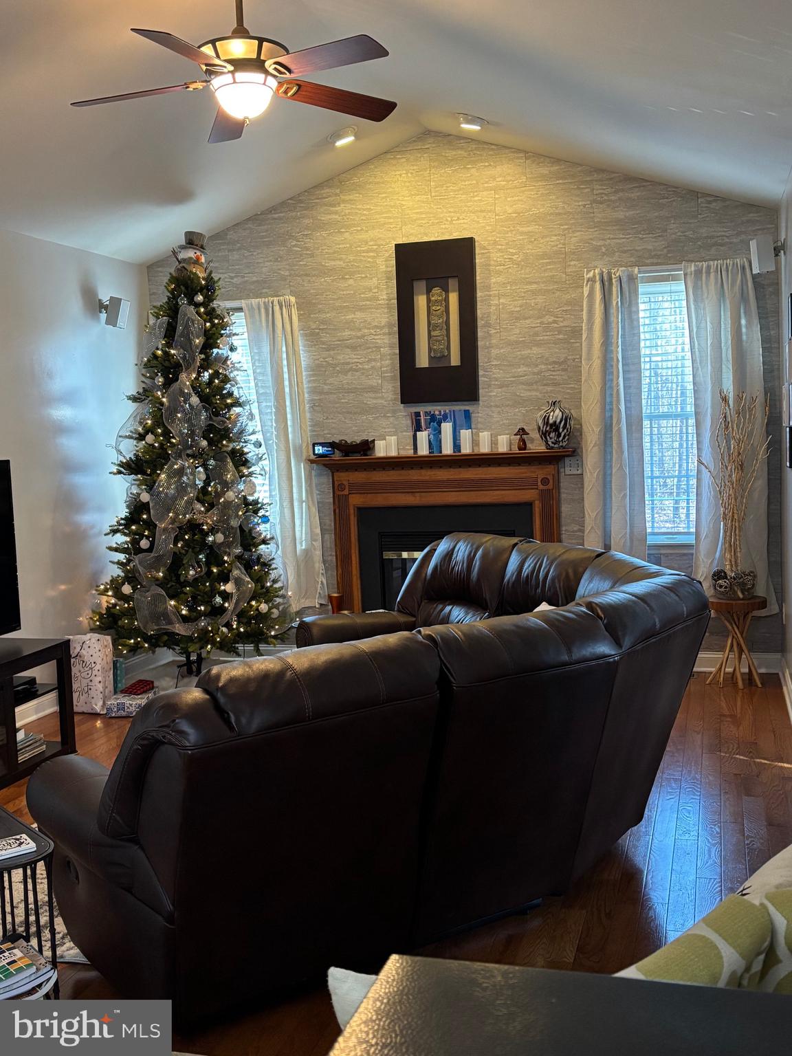 133 Steelton Road Sicklerville, NJ 08081 - Photo 12 of 35 a living room with furniture and a flat screen tv