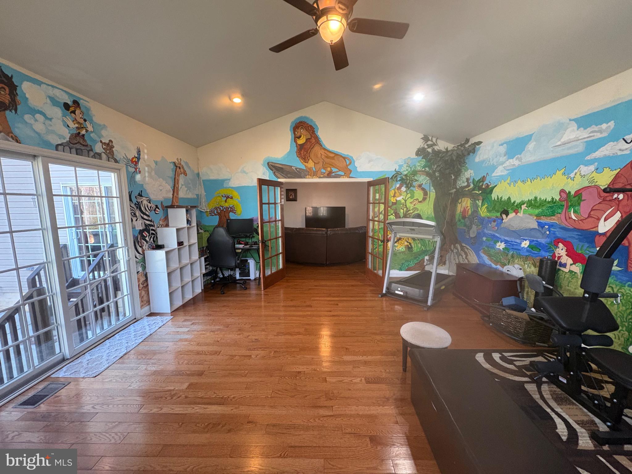 133 Steelton Road Sicklerville, NJ 08081 - Photo 15 of 35 a living room with furniture gym equipment and a view of kitchen