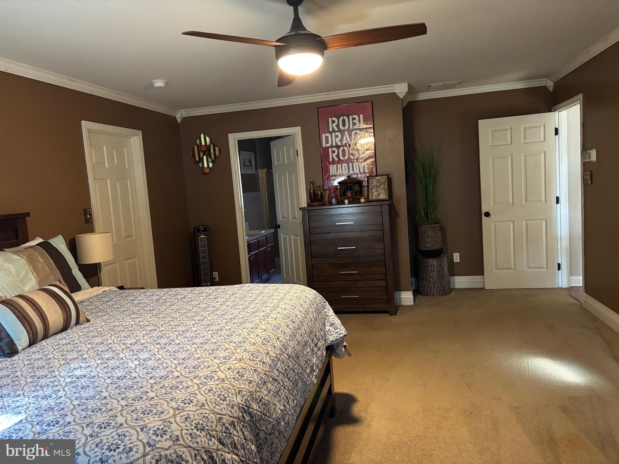 133 Steelton Road Sicklerville, NJ 08081 - Photo 24 of 35 a bedroom with a bed and closet with mirror