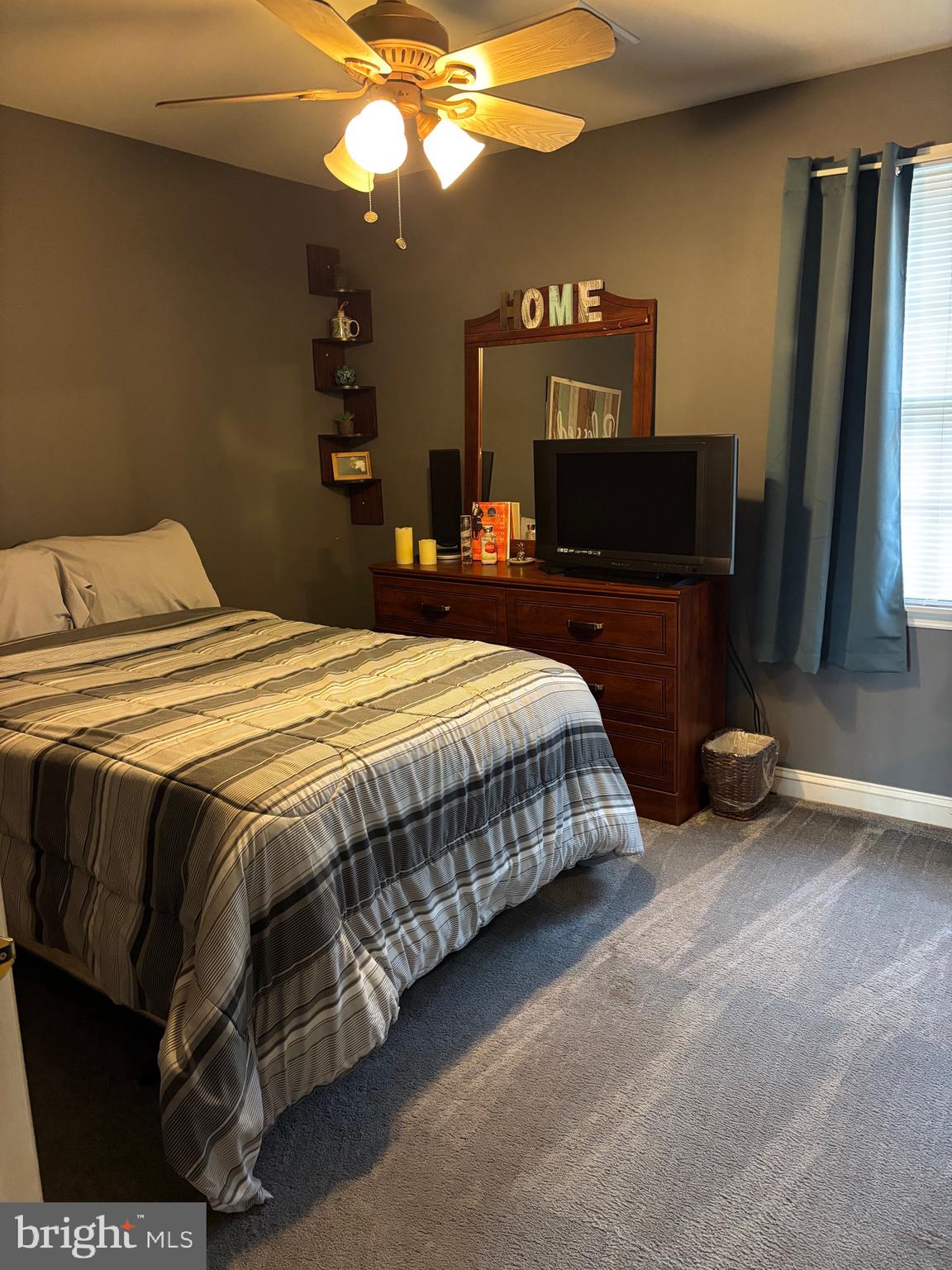133 Steelton Road Sicklerville, NJ 08081 - Photo 29 of 35 a bedroom with a bed and a flat tv screen on dresser