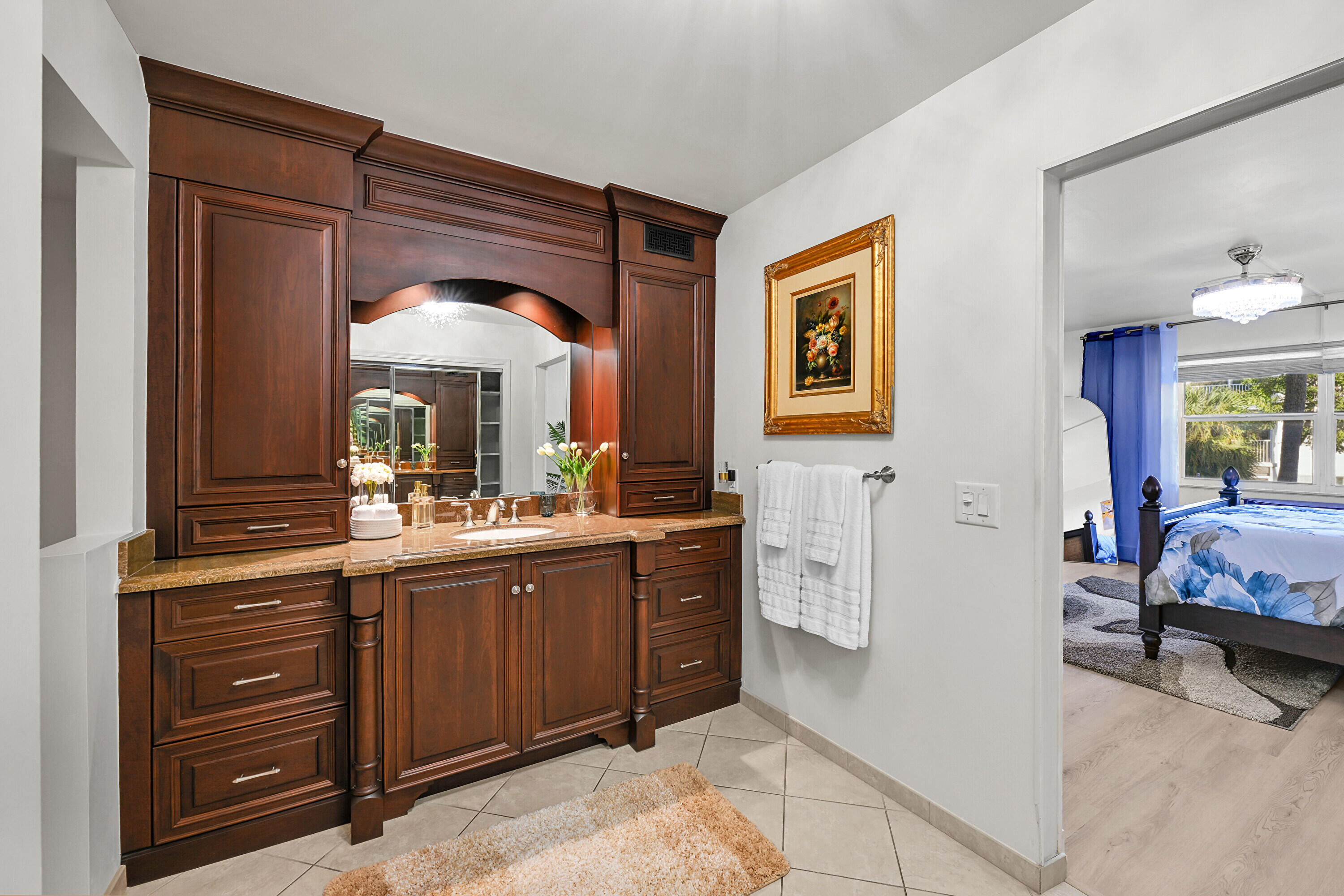 800 East Camino Real, Unit 204 Boca Raton, FL 33432 - Photo 21 of 39 a kitchen with a sink and cabinets