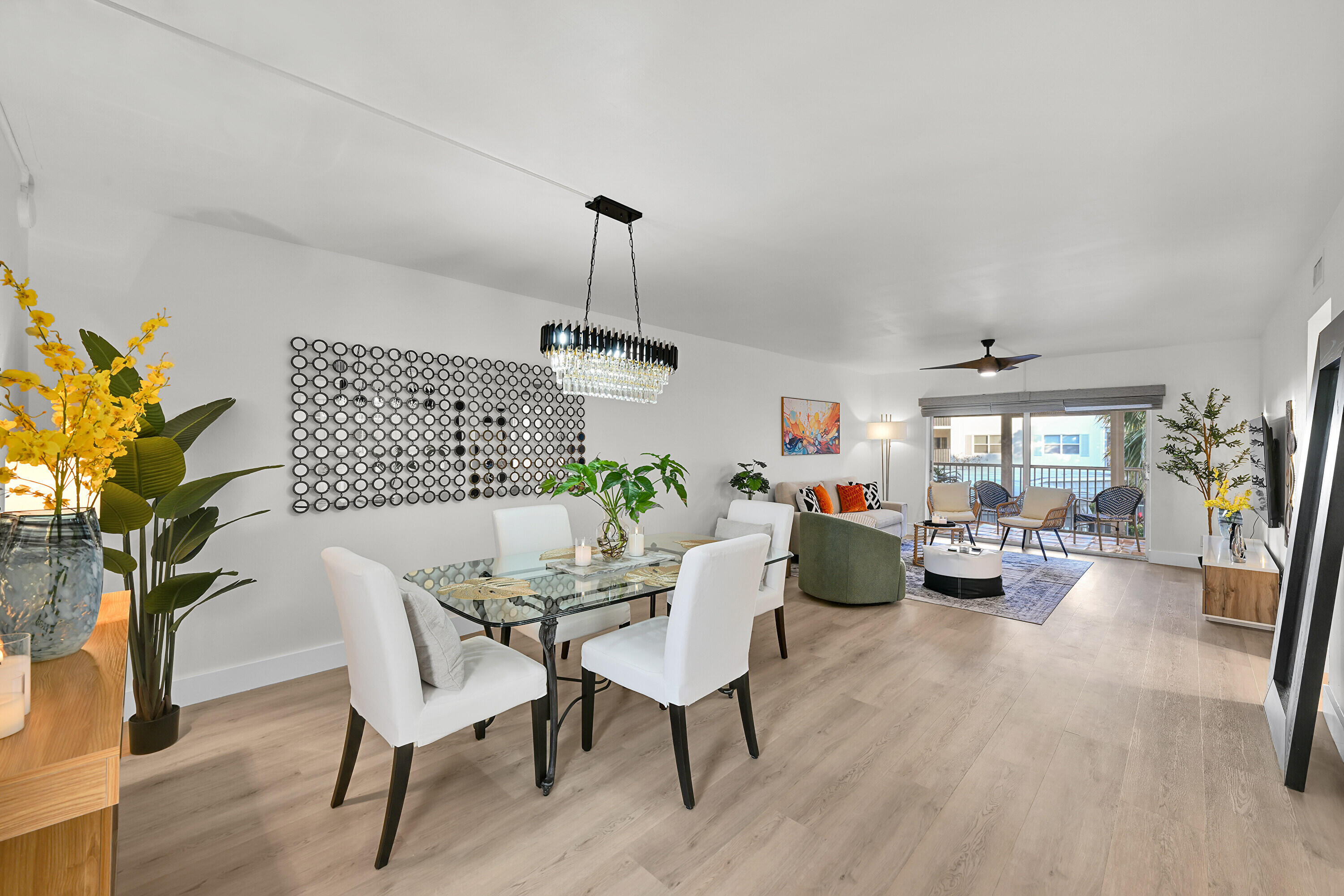 800 East Camino Real, Unit 204 Boca Raton, FL 33432 - Photo 4 of 39 a view of a livingroom with furniture window and wooden floor