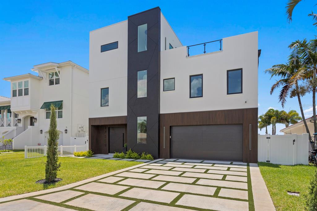 17059 Dolphin Drive North Redington Beach, FL 33708 - Photo 1 of 1 a house view with a garden space