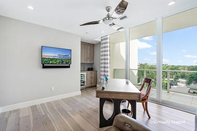 a view of a dining room with furniture window and outside view