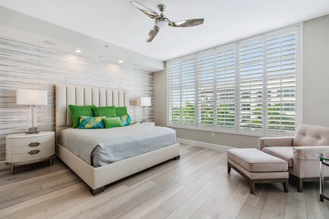 a living room with a bed and a couch