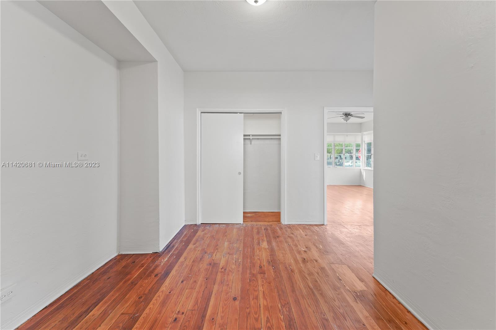 531 16th Street Miami Beach, FL 33139 - Photo 21 of 26 a view of a room with wooden floor and a hallway