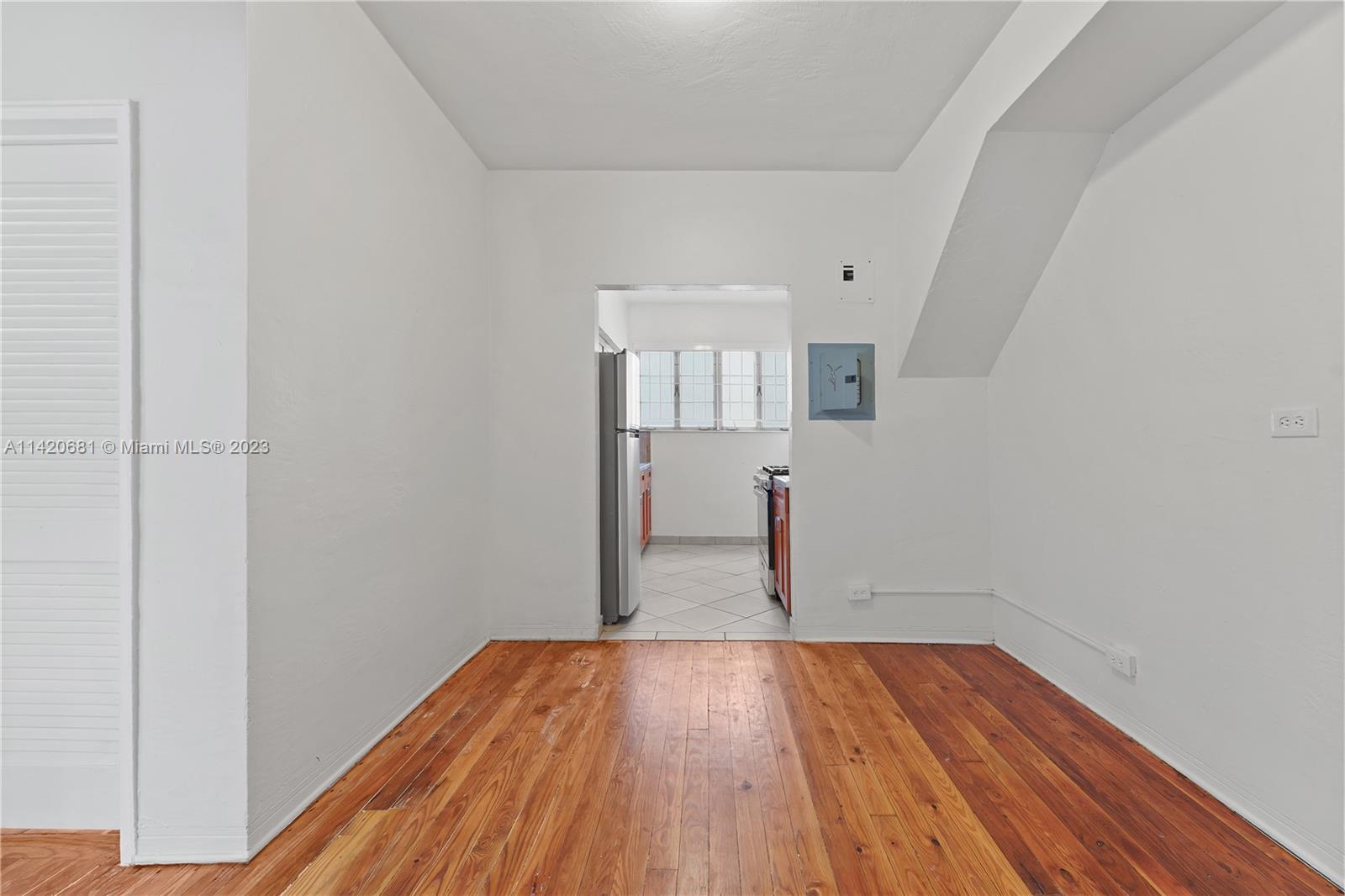 531 16th Street Miami Beach, FL 33139 - Photo 22 of 26 a view of empty room with wooden floor