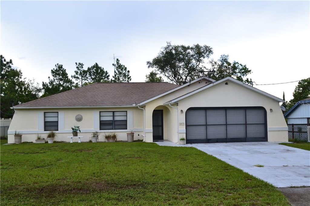 11479 Cavern Road Spring Hill, FL 34609 - Photo 1 of 1 Front of the home.