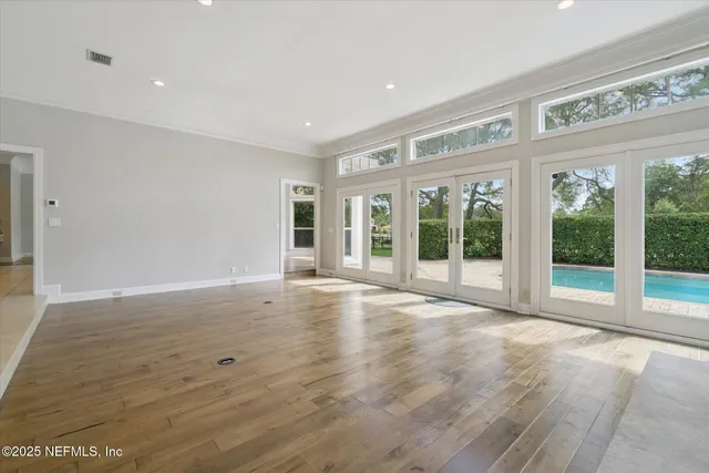a bathroom with a bathtub and a sink