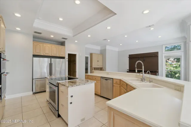 a en suite bathroom with a sink a mirror and a shower