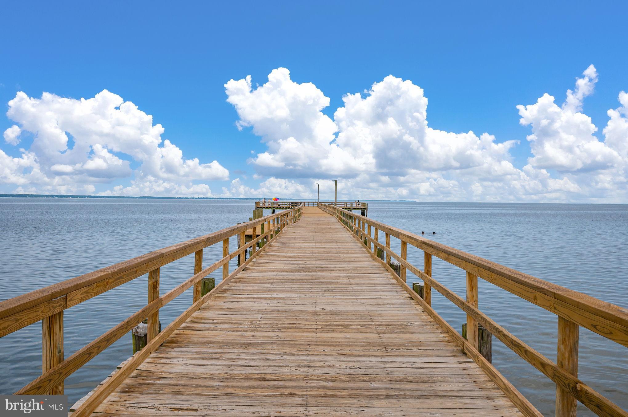 312 9th Street Colonial Beach, VA 22443 - Photo 42 of 62 Tranquil pier stretching into serene waters.