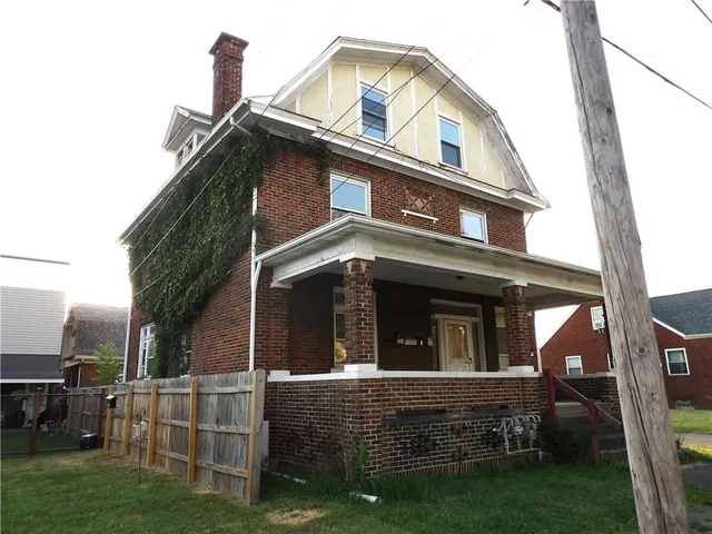 a view of a house with a large window