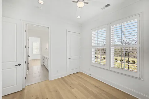 a bathroom with a sink a mirror and a mirror