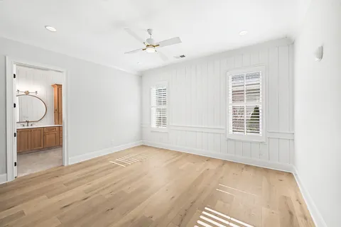 a view of a park with large trees