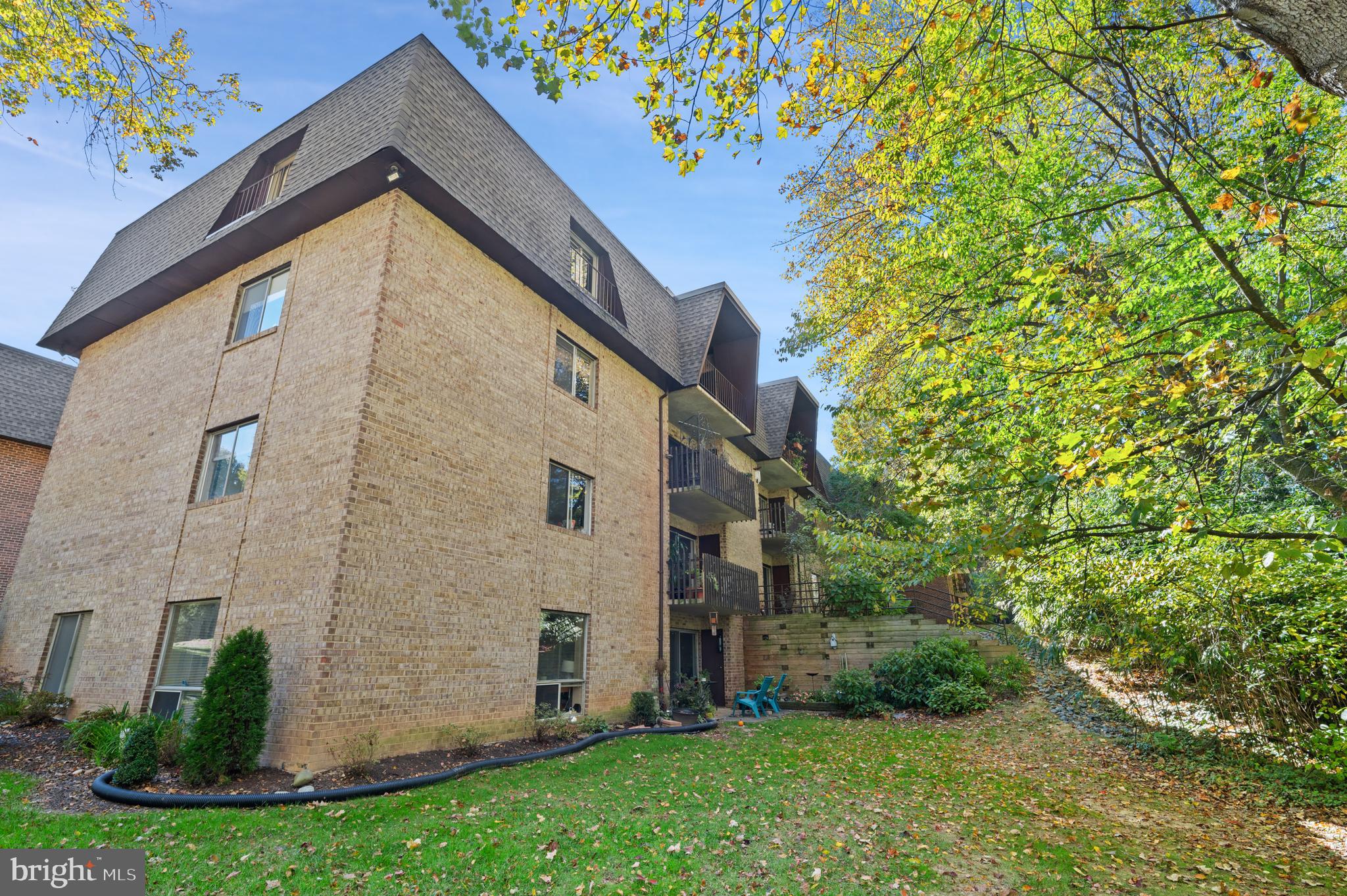 11616 Vantage Hill Road, Unit 2C Reston, VA 20190 - Photo 22 of 23 Rear view of building with balcony