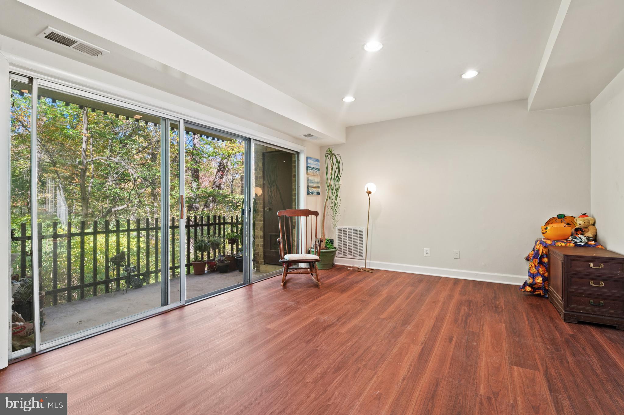 11616 Vantage Hill Road, Unit 2C Reston, VA 20190 - Photo 3 of 23 Living room features windows to the balcony