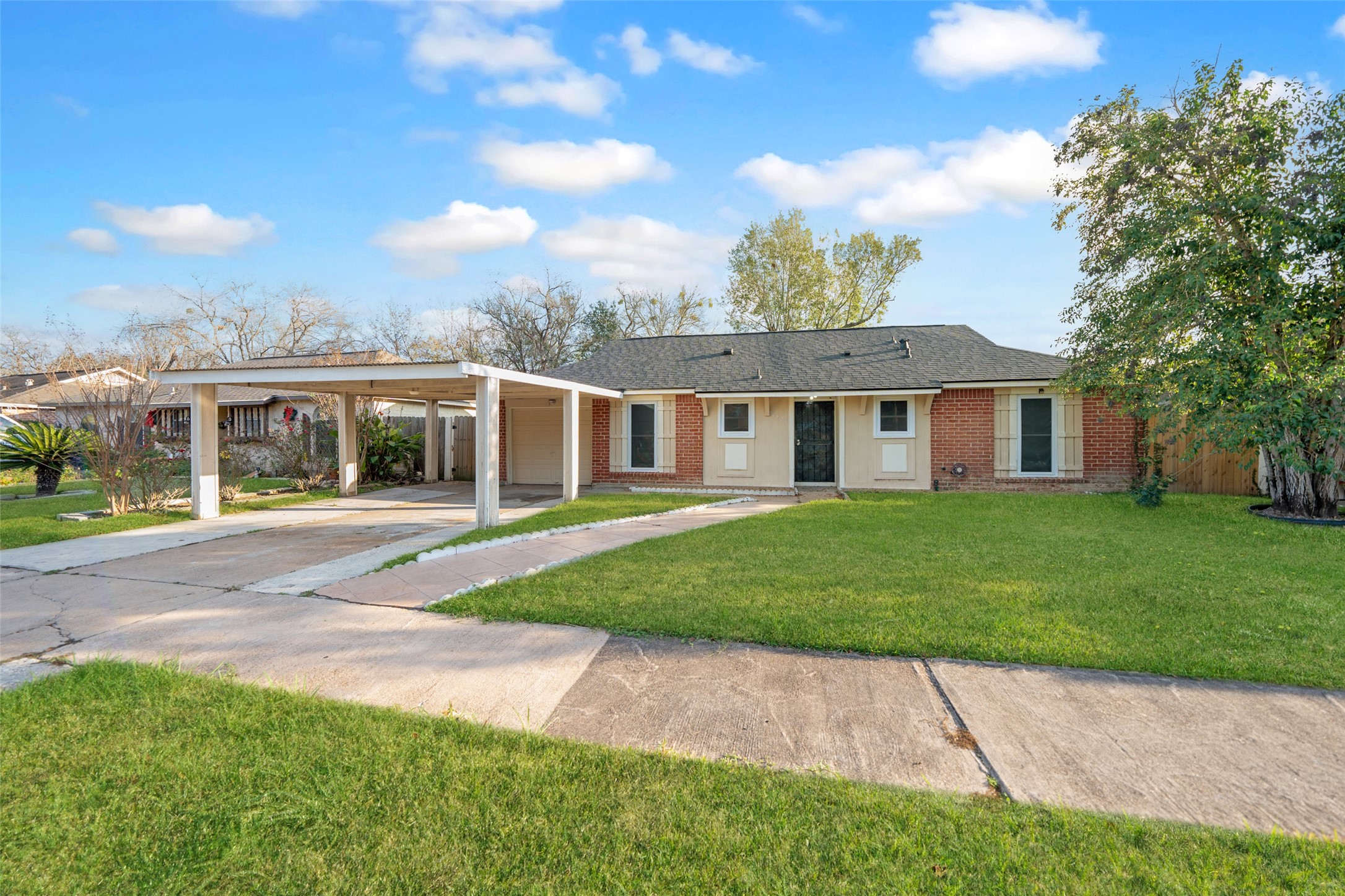 front view of a house with a yard