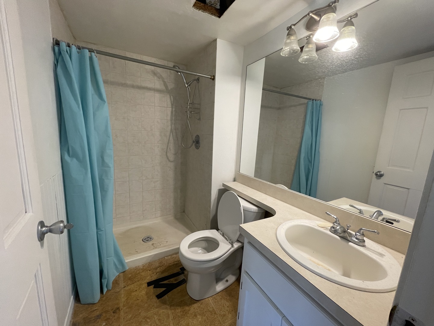 2061 Windward Lane Hanover Park, IL 60133 - Photo 12 of 15 a bathroom with a sink toilet and shower