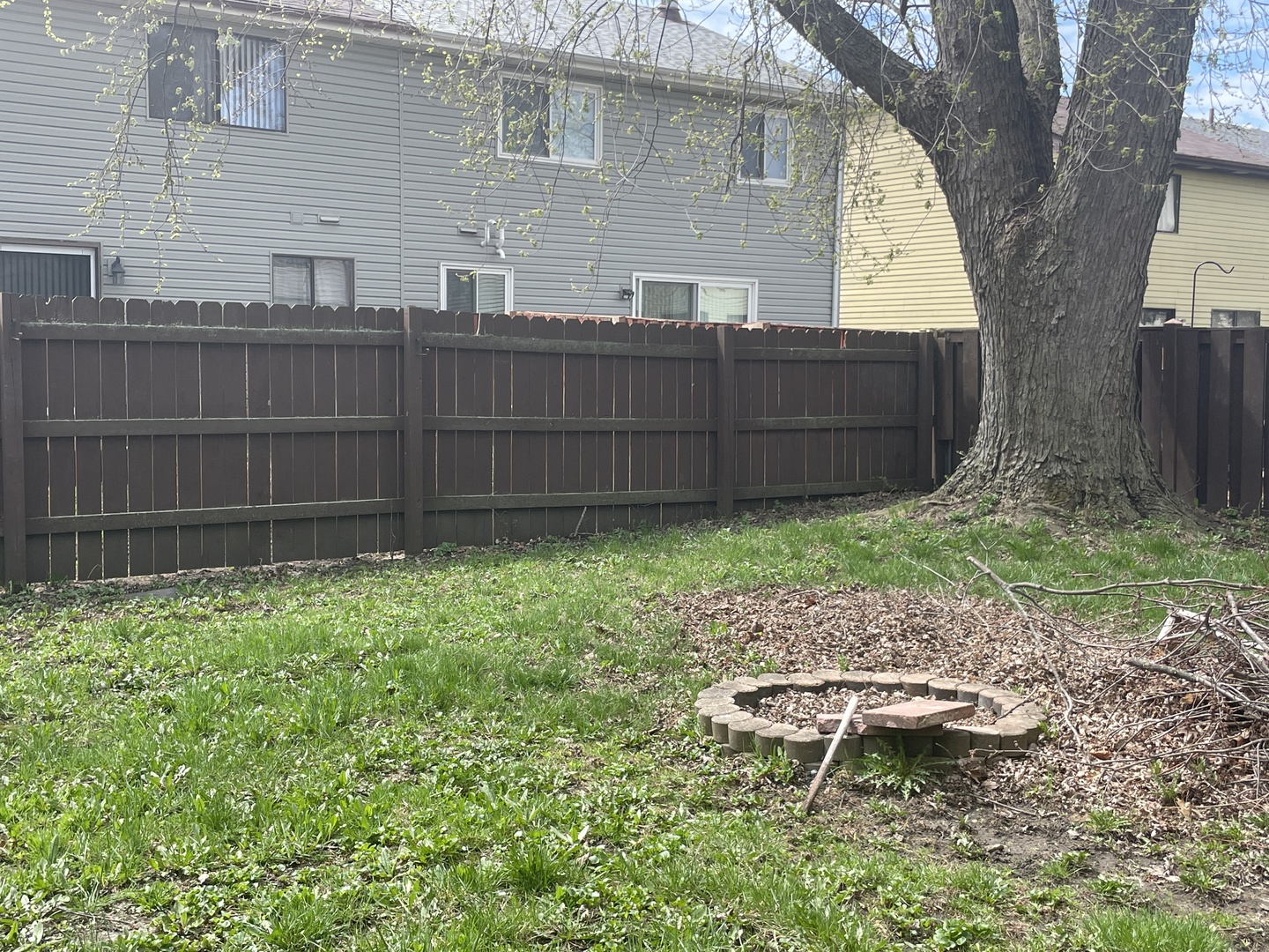 2061 Windward Lane Hanover Park, IL 60133 - Photo 15 of 15 a view of a backyard with a garden