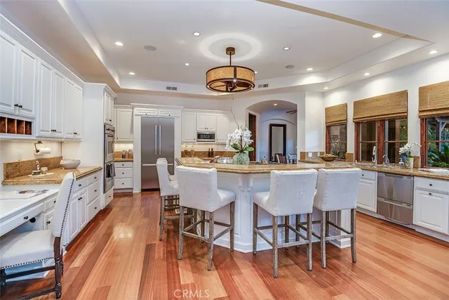 a living room with fireplace furniture and a flat screen tv