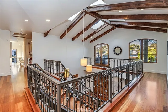 a spacious bathroom with sink shower and mirror
