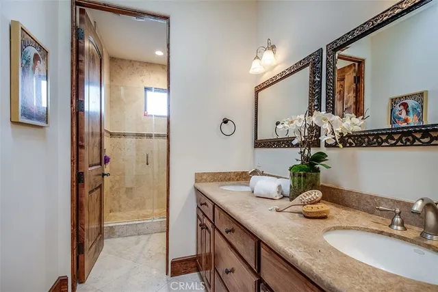 a room with furniture projector and screen