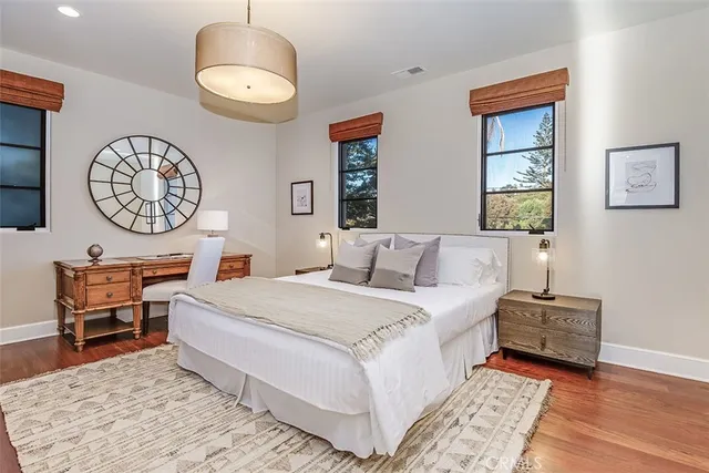 a kitchen with a refrigerator and a stove