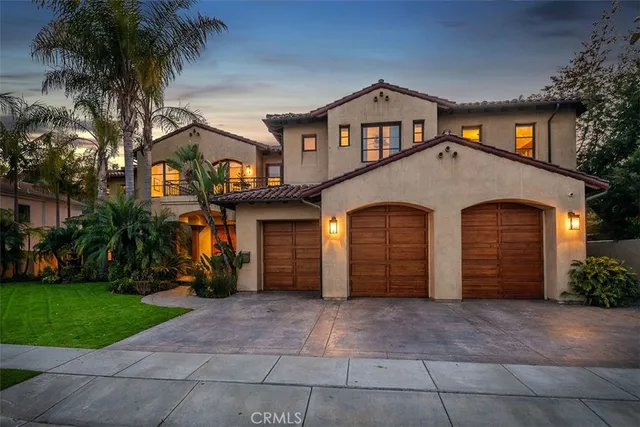 a view of entryway livingroom and hall with wooden floor