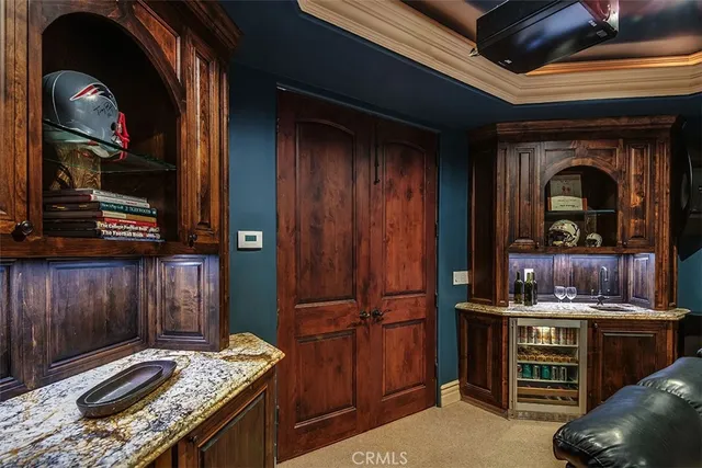 a bedroom with a large bed and a large window