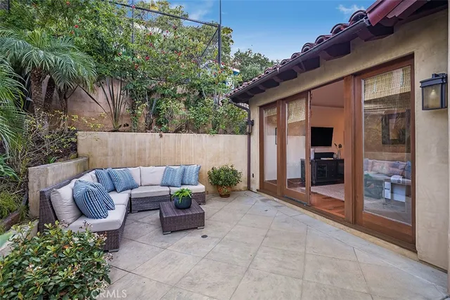 a view of an house with swimming pool and porch