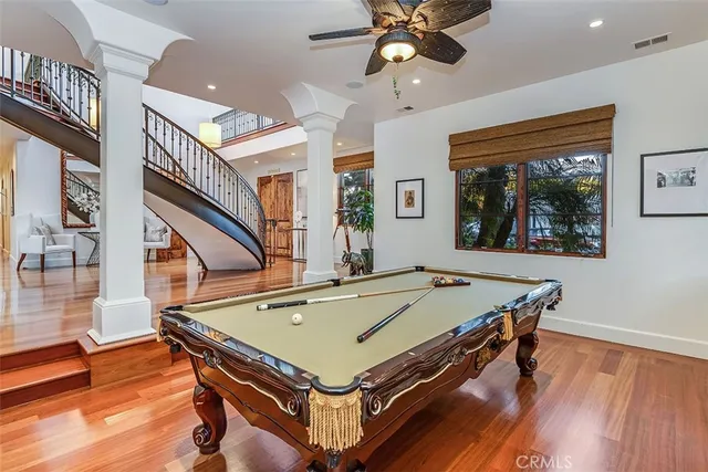 a view of a dining room kitchen with furniture and wooden floor