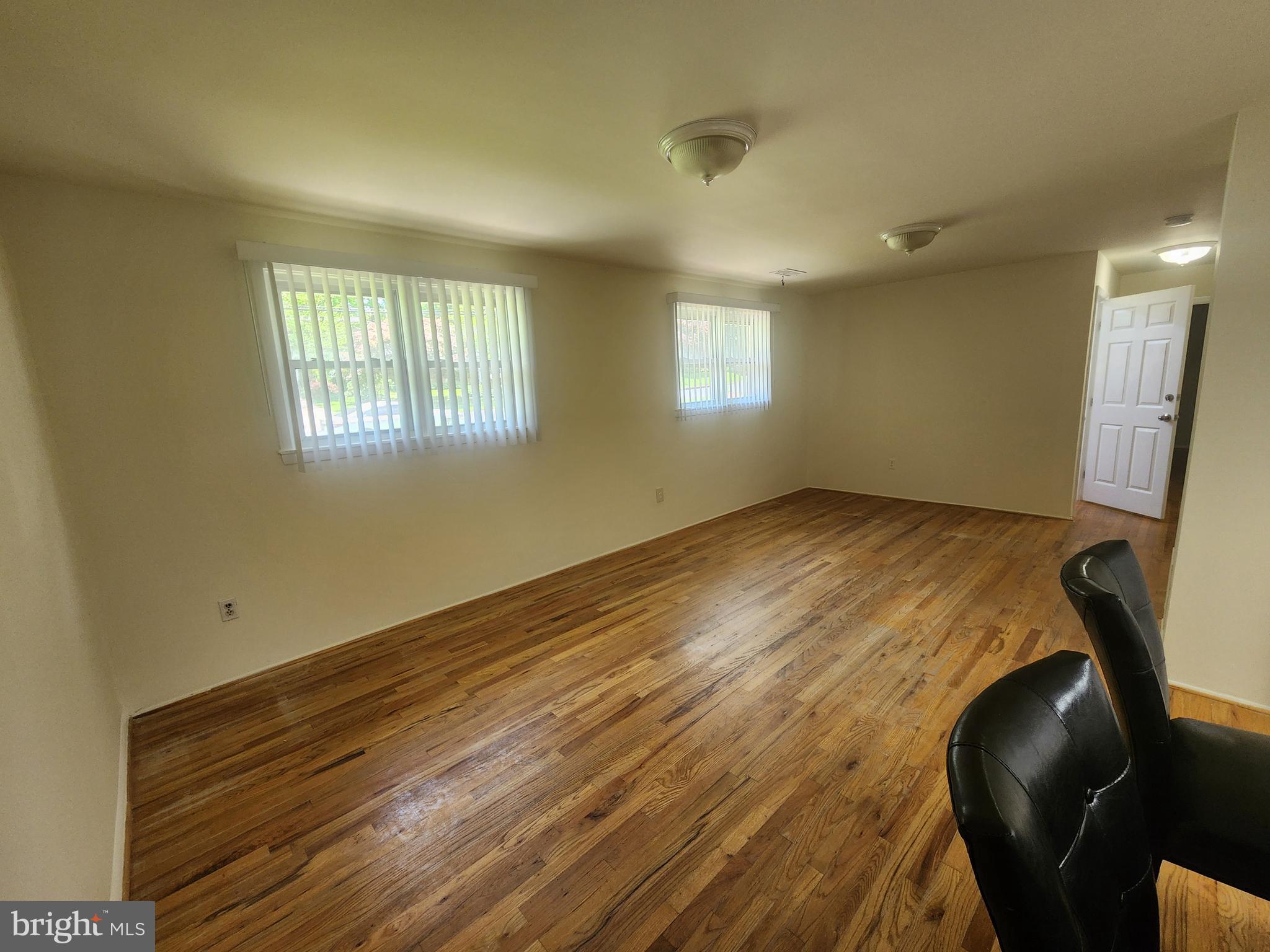 13416 Tamarack Road Silver Spring, MD 20904 - Photo 6 of 21 a view of room with window and hardwood floor