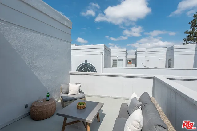 a view of a outdoor seating area with furniture