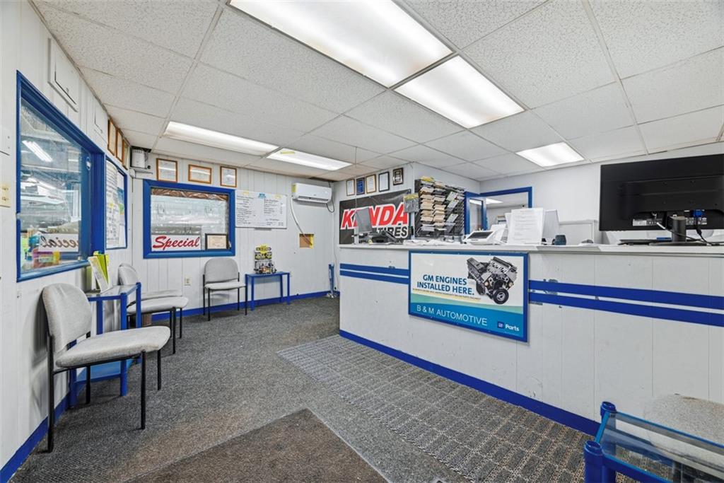4225 Main Street Pittsburgh, PA 15224 - Photo 12 of 30 a living room with furniture and a flat screen tv