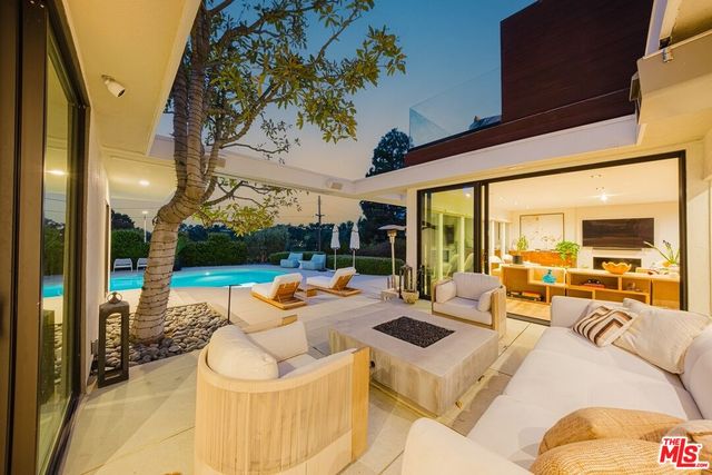 a outdoor space with patio the couches and pool