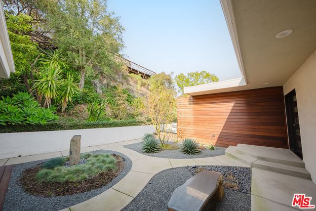 a bed room with a bed and a couch