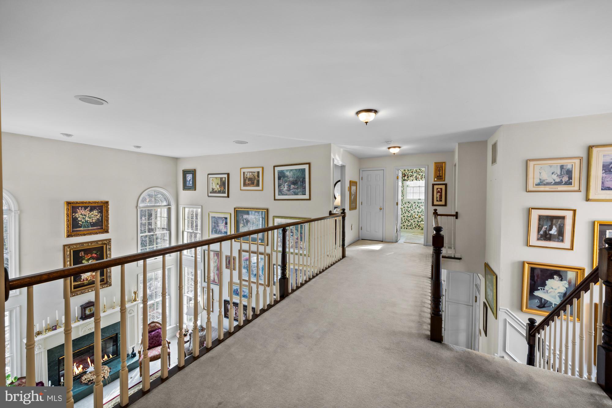 4 Independence Way Southampton, NJ 08088 - Photo 15 of 25 a view of a hallway with windows and stairs