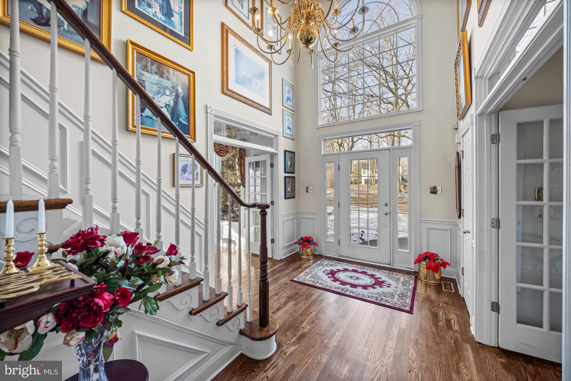 4 Independence Way Southampton, NJ 08088 - Photo 2 of 25 a view of an entryway with wooden floor
