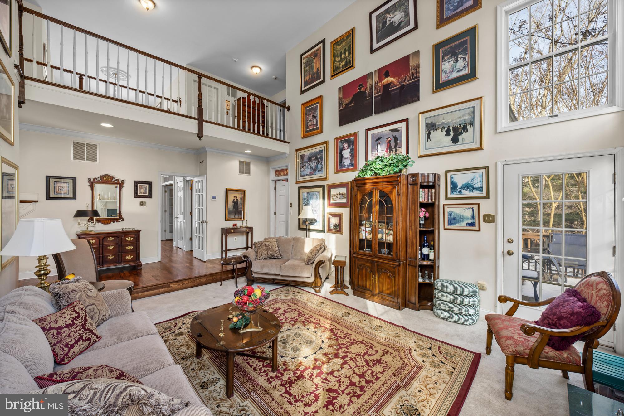 4 Independence Way Southampton, NJ 08088 - Photo 8 of 25 a living room with furniture and wooden floor