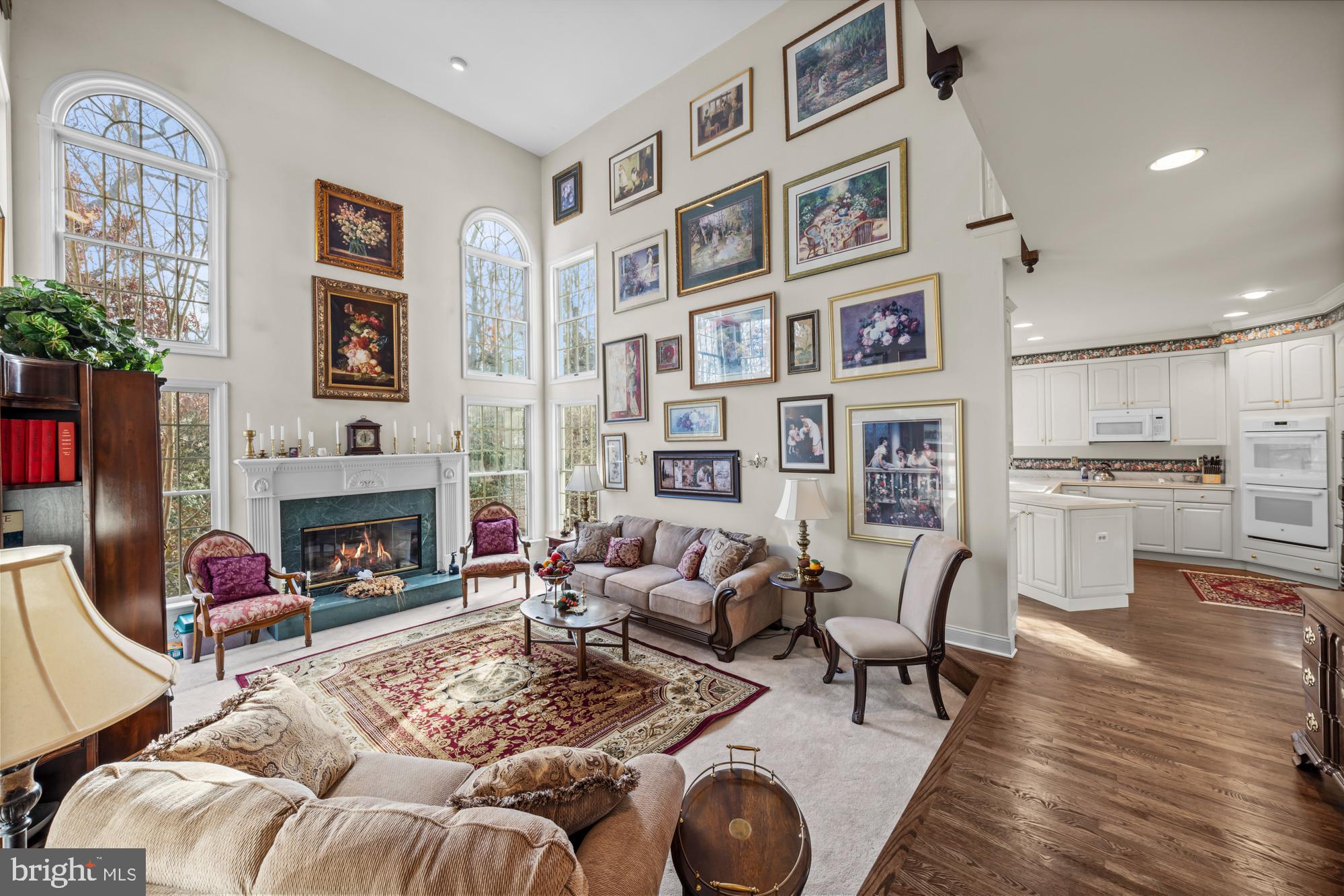 4 Independence Way Southampton, NJ 08088 - Photo 9 of 25 a living room with furniture fireplace and rug