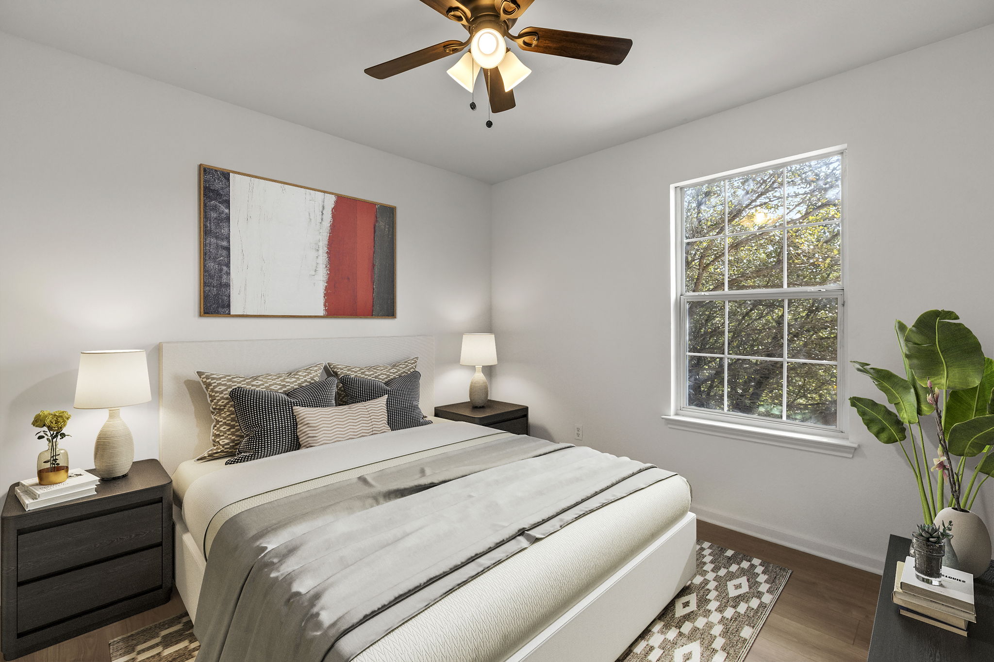2110 Nogales Trail Austin, TX 78744 - Photo 25 of 36 Bedroom featuring wood finished floors and ceiling fan. Virtually Staged.