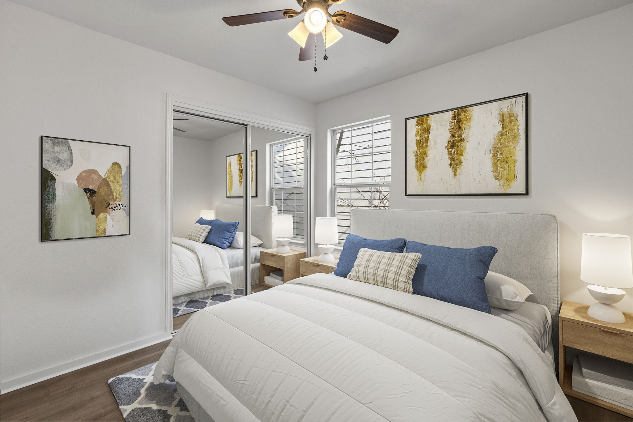 2110 Nogales Trail Austin, TX 78744 - Photo 26 of 36 Bedroom with dark wood-type flooring, ceiling fan, and a closet. Virtually Staged.