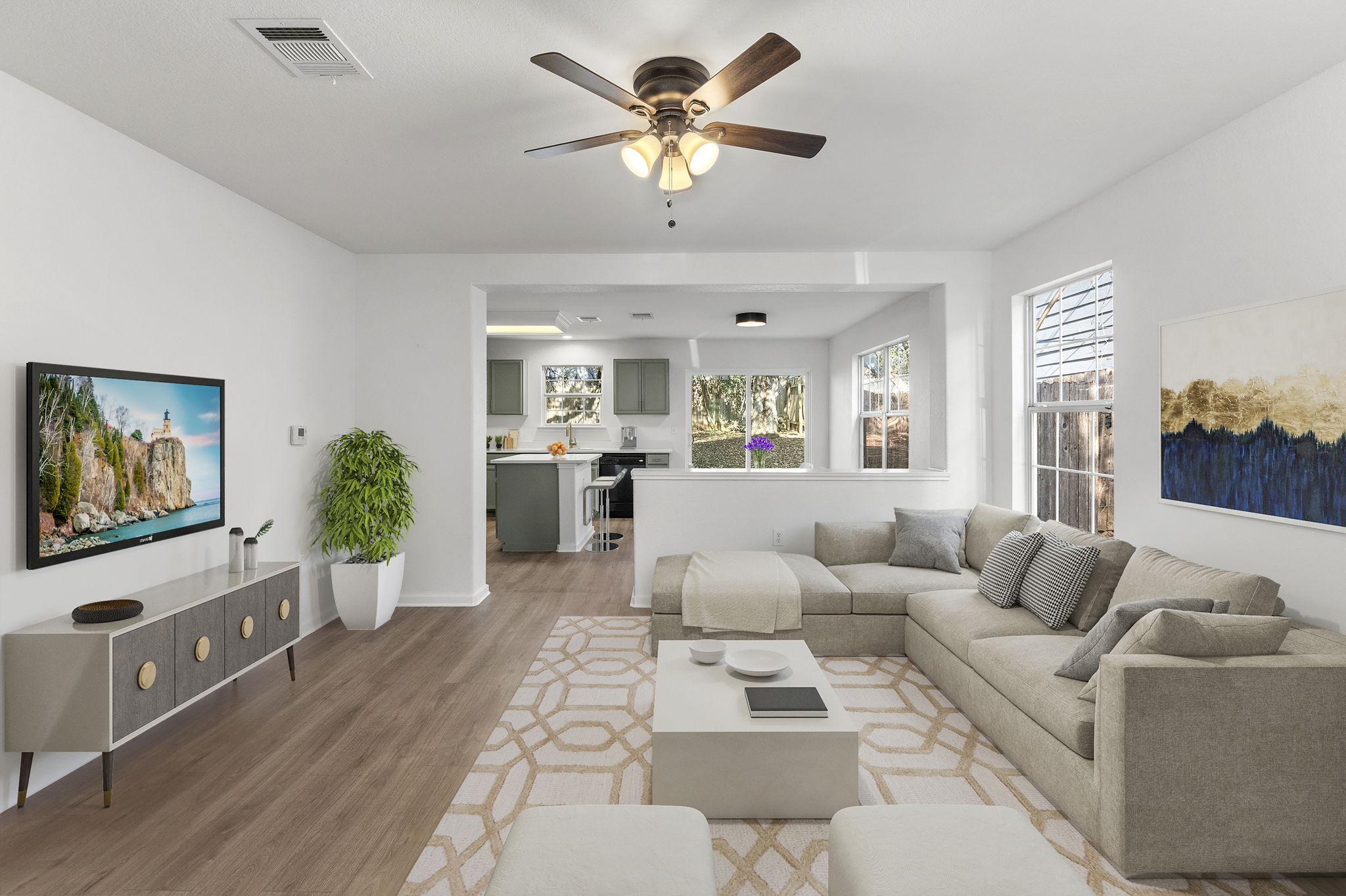 2110 Nogales Trail Austin, TX 78744 - Photo 4 of 36 Living room with light wood-type flooring and ceiling fan. Virtually Staged