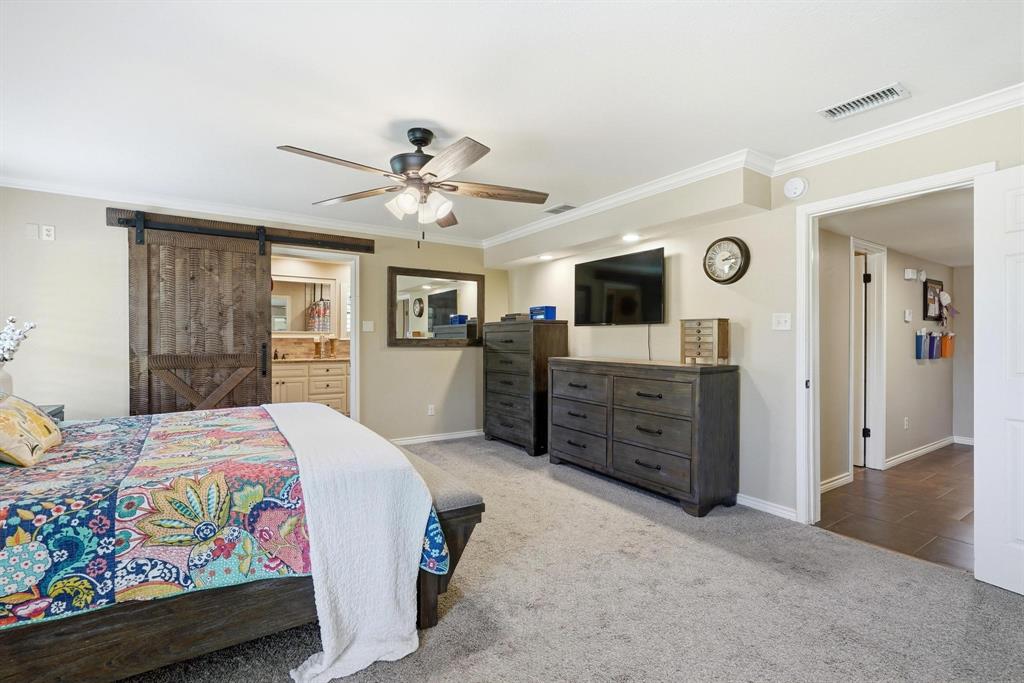 432 Clark Road Abilene, TX 79602 - Photo 14 of 40 a bedroom with a bed and furniture