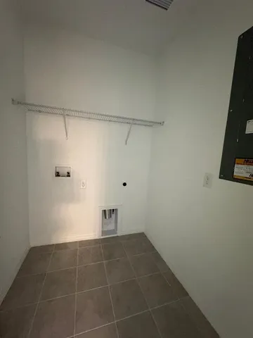 a view of a room with an empty space