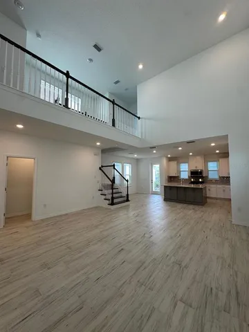 a view of a living room and dining room