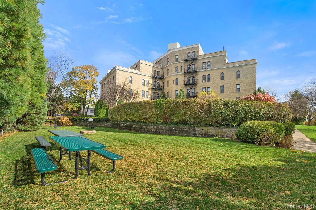 43 Calton Road, Unit 5C New Rochelle, NY 10804 - Photo 27 of 32 View of home's community featuring a lawn