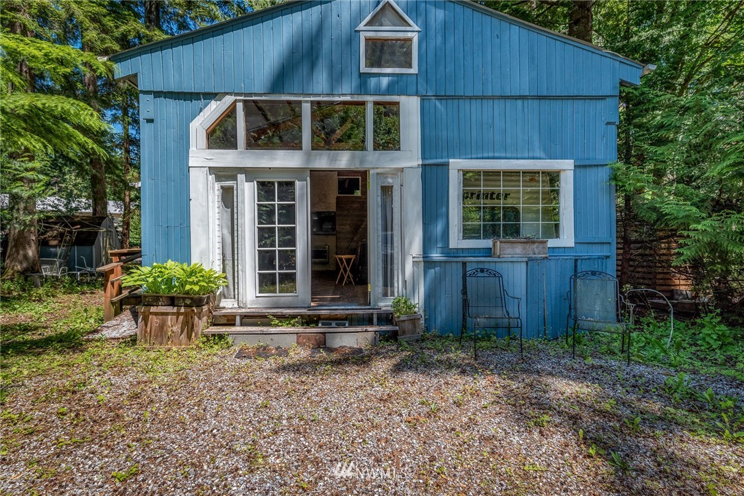 3031 Tower Road Maple Falls, WA 98266 - Photo 1 of 22 a front view of a house with garden