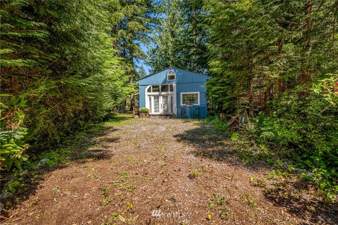 3031 Tower Road Maple Falls, WA 98266 - Photo 2 of 22 a house with trees in front of it